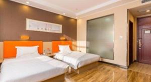 Ένα ή περισσότερα κρεβάτια σε δωμάτιο στο 7 Days Premium·Hotel Pei County Longcheng International +70 φωτογραφίες