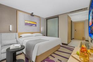 Postel nebo postele na pokoji v ubytování Lavande Hotels Ganzhou Golden Plaza + 220 fotografií