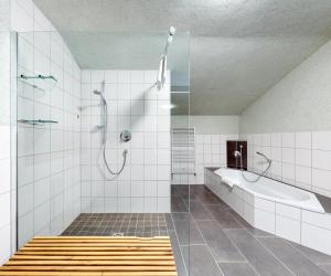 Ванная комната в Chalet Wasserfall 52 mit Sauna