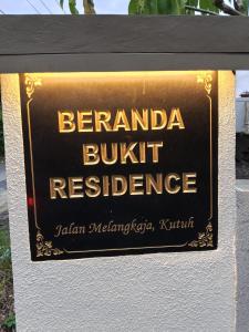 a sign that reads benjamin buffett residence on a wall at Pandan de Bali in Ungasan
