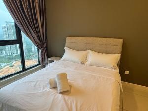 Postel nebo postele na pokoji v ubytování Elysia Park Legoland Iskandar