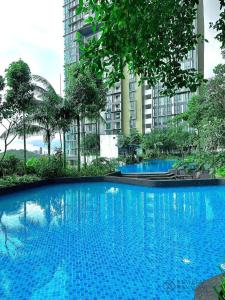 Bazén v ubytování Elysia Park Legoland Iskandar nebo v jeho okolí