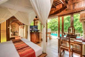 Et tv og/eller underholdning på Santhiya Koh Phangan - Hideaway Pool Villa