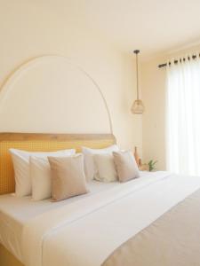 Giường trong phòng chung tại Samudrá Ahangama