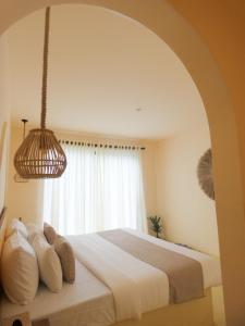 Giường trong phòng chung tại Samudrá Ahangama