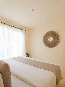 Giường trong phòng chung tại Samudrá Ahangama