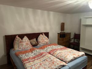 Ένα ή περισσότερα κρεβάτια σε δωμάτιο στο Cinthias Sonnseiten Apartments Panoramalage über Altenmarkt, Nähe Therme und Skigebiet