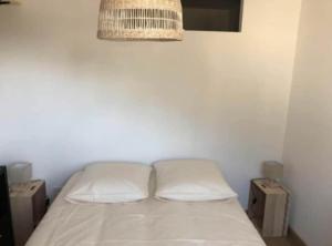 Кровать или кровати в номере Gîte soline avec piscine chauffée