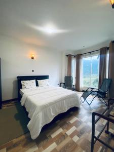 Кровать или кровати в номере Cool Cloud Villa