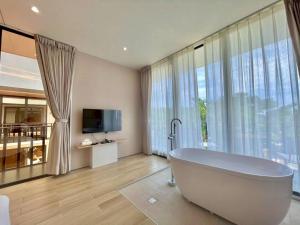 TV/trung tâm giải trí tại WangWangSea Villa