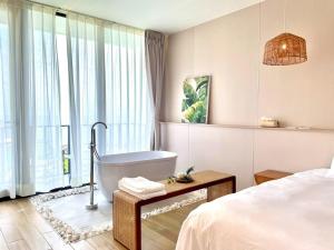 Giường trong phòng chung tại WangWangSea Villa +22 ảnh