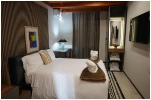 Ένα ή περισσότερα κρεβάτια σε δωμάτιο στο Hotel Villa Nunziante Pompei