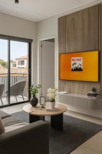 TV/trung tâm giải trí tại The Blyde Luxury Apartment