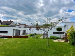 Zahrada ubytování Logis 11 Apartments