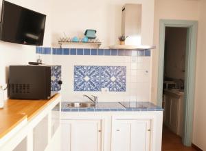 Kuchyň nebo kuchyňský kout v ubytování La Casa di Orimari + 31 fotografií