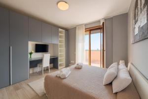 Ένα ή περισσότερα κρεβάτια σε δωμάτιο στο Residenze Italia