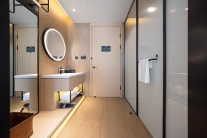 Un baño de Jin Yi Hotel, Ordos Dongsheng District Branch 24 fotos más