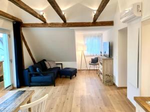 Posezení v ubytování Logis 11 Apartments