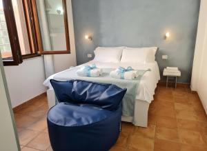 Postel nebo postele na pokoji v ubytování La Casa di Orimari