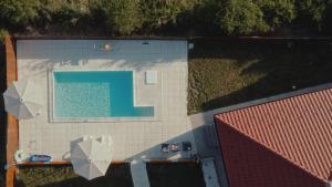 an overhead view of a swimming pool on a building at Avalska Bajka in Ripanj