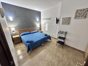 Postel nebo postele na pokoji v ubytování Edificio Prieto VIV 2B