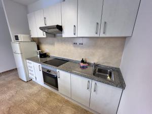 Kuchyň nebo kuchyňský kout v ubytování Edificio Prieto VIV 2B