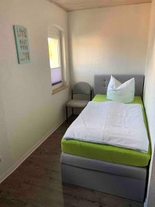 Postel nebo postele na pokoji v ubytování Ferienwohnung mit Dachterrasse