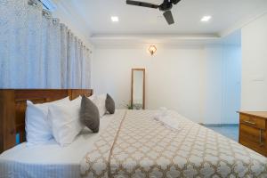 Giường trong phòng chung tại Alaya Stays Matts Homestay 1-Room Lakeside Stay With Common Lounge +33 ảnh
