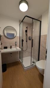 Koupelna v ubytování Müllerbräu Braugasthof