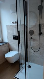 Koupelna v ubytování Müllerbräu Braugasthof