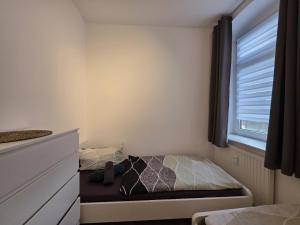 Ένα ή περισσότερα κρεβάτια σε δωμάτιο στο Mikra Homes24 in Zwickau +3 φωτογραφίες