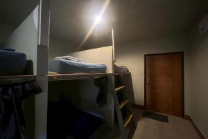 Una cama o camas en una habitación de Noahs Ark Bar Restaurant Hostel