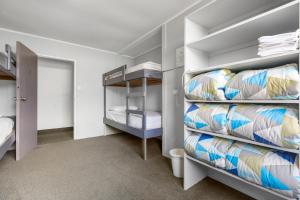 Postel nebo postele na pokoji v ubytování Manowhenua Lodge