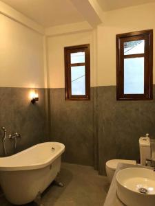 Ένα μπάνιο στο Villa Coconut Tree