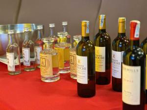 a group of bottles of wine sitting on a table at Crowne Plaza Danang, an IHG Hotel in Danang