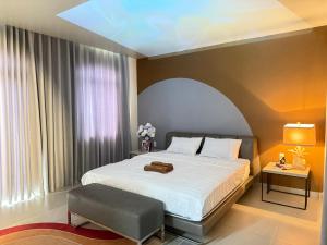 Ένα ή περισσότερα κρεβάτια σε δωμάτιο στο LV TPHomes +90 φωτογραφίες