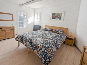 Postel nebo postele na pokoji v ubytování Charmant T3 dans un mas provençal proche Avignon