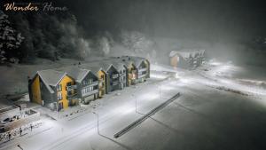 Το Wonder Hill - klimatyzowane apartamenty z bajkowym widokiem na góry i zalew τον χειμώνα