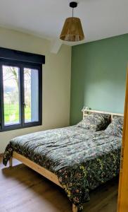 Postel nebo postele na pokoji v ubytování La Grange