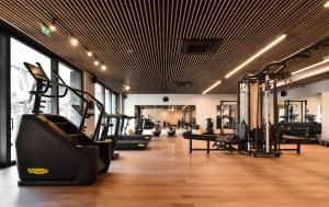 a gym with treadmills and elliptical machines at Hotel HAYASHI - Free Parking and Fitness in Sofia