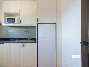 Kuchyň nebo kuchyňský kout v ubytování Living Artenara - NATURE Adults Only + 62 fotografií