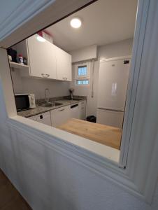 Una cocina o cocineta en Livingtarifa Azahar