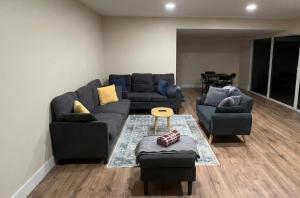a living room with a couch and two couches at Pet & Family-Friendly 4BR Grill & Chill in Sacramento +26 photos