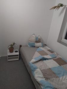 Postel nebo postele na pokoji v ubytování Ferienwohnung in Niederbayern