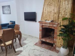 Μια τηλεόραση ή/και κέντρο ψυχαγωγίας στο Lodge la calma +11 φωτογραφίες