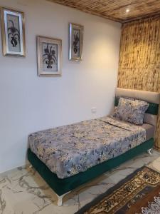 Ένα ή περισσότερα κρεβάτια σε δωμάτιο στο Lodge la calma