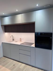 Η κουζίνα ή μικρή κουζίνα στο Brume - face au vieux port, hyper-centre