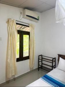 Postel nebo postele na pokoji v ubytování Hide Jungle