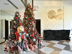 a christmas tree in a hotel lobby at The Key Beirut in Beirut