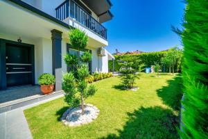 Un jardín fuera de AYSİMA GÖCEK-- Peaceful Holiday Villa Near the Sea in Gocek